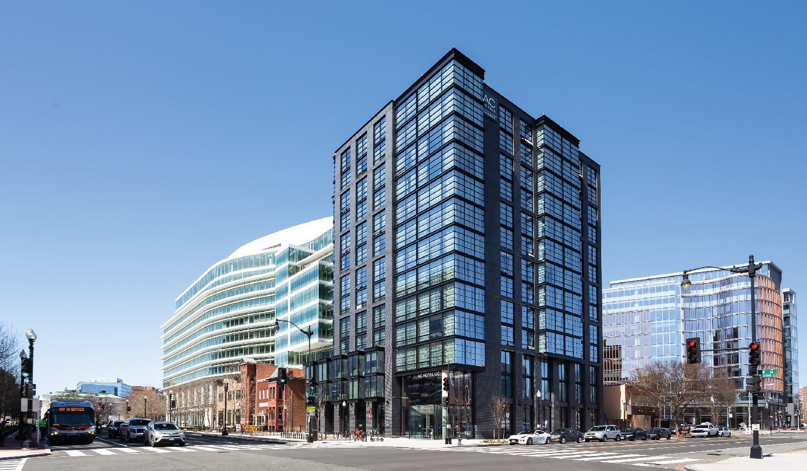 AC Hotel, Washington, D.C.: a dark-framed glass hotel on a street corner